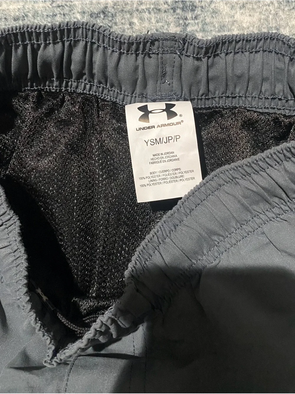 Under Armour boys Gray Black Colorblock swim trunks size small